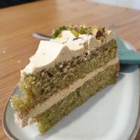 Pistachio cake 9/10- Idk when it happened but maybe my fave type of cake now are they all this good!?! at Dosa Dosa in Prague