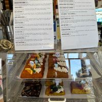 One part of the desert case with menus. at Eris Food Co in Oceanside