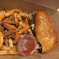 Philly Cheezestake Sando served with fries (& homemade catchup)   at Eris Food Co in Oceanside