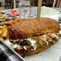 Cheesesteak and animal fries (grilled onions & thousand island)  at Eris Food Co in Oceanside