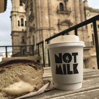 Boston Cream + flat white at Bun and Coffee in Malaga