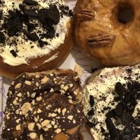 3 donuts (cookies and cream and caramel) & one chocolate roll 😋  at Bun and Coffee in Malaga