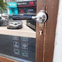Door handle at Kafeterija Niš in Nis