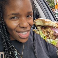 Vegan Crab cake sandwich with NuVegan sauce lettuce tomato and a Very soft bun at NuVegan in Baltimore