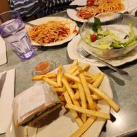 chickn parm spaghetti/ bread combo and chickn sandwich fries/salad combo at Court Square Diner in Queens