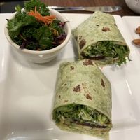Eggplant bacon wrap with kale salad  at Good Life Cafe in Columbia