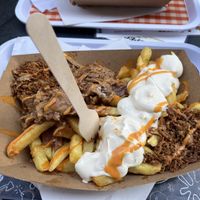 Great vegan options. Portion Medium fries with the special is enormous but great!   at Frituur Arré Patat in Antwerpen