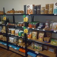 Fresh bread, cereal, snacks, and dried foods at Parada Vegana in Cusco