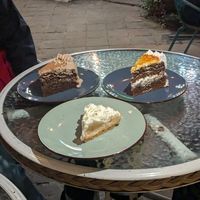 Chocolate cake, orange and chocolate cake, lemon pie at Parada Vegana in Cusco