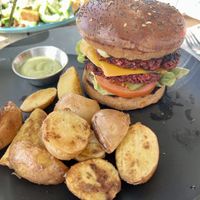 Vegan burger with potatoes   at Teapot Cafe in Taghazout
