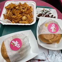 Waffle fries, chicken wings, and two different chicken sandwich specials. So. Good!  #Veganuary at Vegan On The Fly in New York City
