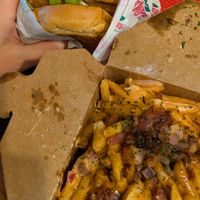 Chicken sandwich, fries with ketchup/mayo/onions at Vegan On The Fly in New York City