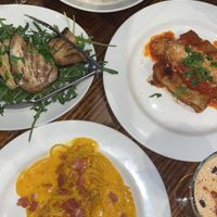 Carbonara, lasagna, truffle pappardelle, eggplant salad  at Funghi E Tartufo in Melbourne