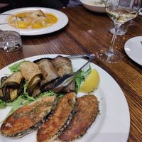 Swordfish, pumpkin ravioli in the background at Funghi E Tartufo in Melbourne