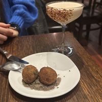 Arancini and cocktail   at Funghi E Tartufo in Melbourne