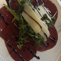 Carpaccio di bresaola con rucola e parmigiano  at Funghi E Tartufo in Melbourne