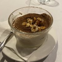 Tiramisú café e Amaretto di Saronno $20- very expensive, but on-point. Gorgeous candied nuts and chocolate powder on top, heavenly cream, lovely amaretto-soaked lady finger spong at Funghi E Tartufo in Melbourne