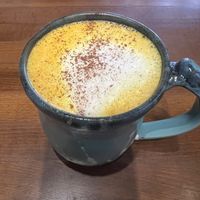 Golden Milk: Ginger, turmeric, cinnamon, pepper, coconut oil, honey, apple cider vinegar, oat milk  at Hartwood in Tulum