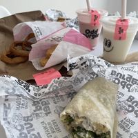 Onion rings, hash browns, milkshakes, chick’n caesar wrap, and maple crunch breakfast sandwich (back)  at Odd Burger in Hamilton