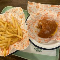 Smash burger with vegan cheese   at Neat - Victoria in South West London