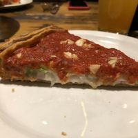 Slice of vegan deep dish  at Patxi's Pizza in Palo Alto