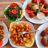 Green beans, Tabouleh, potato cubes, falafel, Kibbeh Mikliyeh at Li Beirut in Dusseldorf