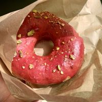 Raspberry glazed with pistachios  at Areca Bakery in Barcelona