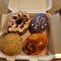 Donuts pistachio, red velvet, crème brulée, crème catalane at Areca Bakery in Barcelona