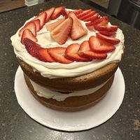 Custom cake made. Vanilla cake with custard, whipped cream, and strawberries    at Keepin it Vegan  in Ottawa