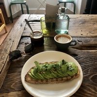 Vegan avocado tostada and coco flat white 💚  at Yegolé Termopolio in Oaxaca