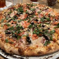 Pizza with vegan mozzarella   at Padre Island Brewing Co in South Padre Island