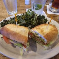 Plant-based chicken sandwich and kale chips at Padre Island Brewing Co in South Padre Island