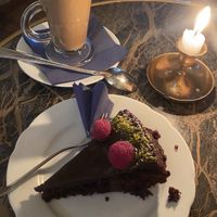 Oat milk chai latte and chocolate cake  at Frau Behrens Torten - Bergmannstraße in Berlin