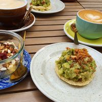 Chia pudding with granola and arepa with avocado. at Léandrés in Paris