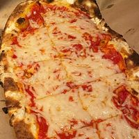 “The Queen” Flatbread with Vegan Mozzarella  at Hearth & Tap Co in Montvale