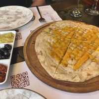Vegan Garlic cheese bread that cones out with every meal   at Cozy Alanya in Alanya