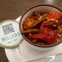 Braised okra and tomatoes with grits  at Millers in Charleston