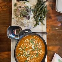 Peanutbutter Siracha chickpea curry with orange marmalade glazed green beans and pickled blueberries    at Pimiento Tea Room in Holly Springs