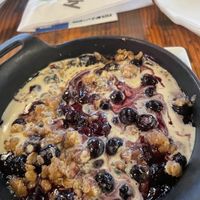 Blueberry cobbler with vegan vanilla cream added   at Pimiento Tea Room in Holly Springs
