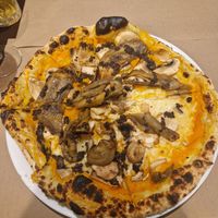 Pumpkin base with mushrooms, aubergine and half with vegan cheese at Pizzeria Pepe Verde in Ericeira