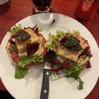 Bagel with beetroot hummus, tofu and beetroot   at Milk in Barcelona