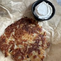 Latke (potato cake and sour cream)   at Ben & Esther's Vegan Jewish Deli in Portland