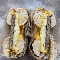 Vegan egg, cheese, sausage, mayo on an everything bagel  at Ben & Esther's Vegan Jewish Deli in Portland