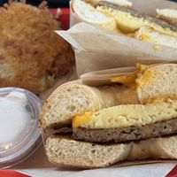 Egg, Cheese, Sausage on Salt Bagel w/ Latke  at Ben & Esther's Vegan Jewish Deli in Portland
