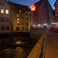 View of Eckerts Wirtshaus from a short distance away. Diners could sit outside over the water. at Eckerts Wirtshaus in Bamberg