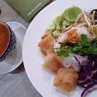 Kanom Jeen Nam Ngiew - 'Kanom Jeen' Fermented Noodles with Chiang Mai Recipe Spicy Soup at Khun Churn in White in Bangkok
