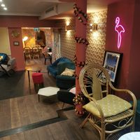 Cozy indoor seating at Emilie and the Cool Kids in Cannes