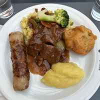 Soy goulash, rice, fried cauliflower, mashed potatoes   at Loving Hut - OC Nový Smíchov in Prague