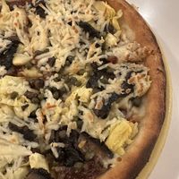 Vegan GF pizza with balsamic marinara and lots of toppings  at Amicas Pizza in Salida