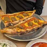 Sucuk and cheese pide at Vegan Masa in Istanbul